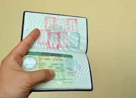 The T3 visitor visa is stamped in passports.