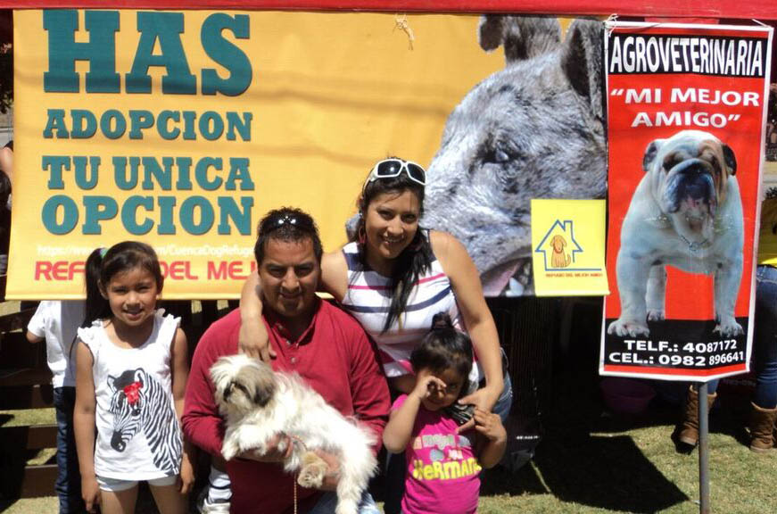 A dogs is adopted at a Parque Paraiso events sponsored by Refugio